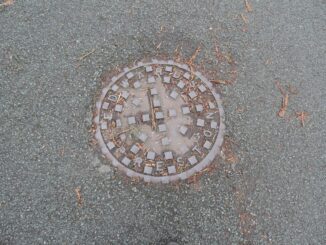 RUSSELL EDWARDS & CO Manhole Cover as seen in Walton le Dale