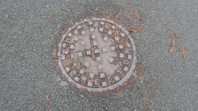 RUSSELL EDWARDS & CO Manhole Cover as seen in Walton le Dale